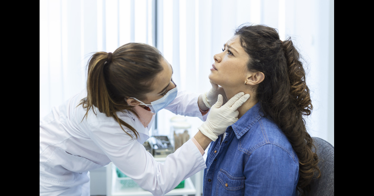 endocrinologist-examining-throat-young-woman-clinic-women-with-thyroid-gland-test-endocrinology-hormones-treatment-inflammation-sore-throat 